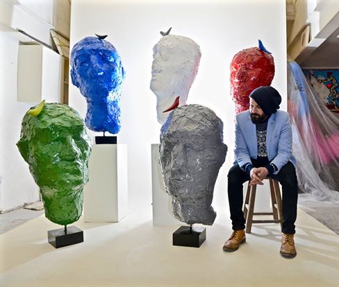 heads-and-sculptor